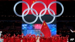 中国队在北京国家体育馆举行的北京冬奥会开幕式上。（2022年2月4日）