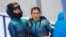 FILE - Australia's Breeana Walker and Kiara Reddingius after crashing during the 2-woman bobsleigh in Bobsleigh & Skeleton World Cup, Latvia, Jan. 2, 2022. 