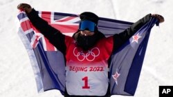 New Zealand's Zoi Sadowski Synnott celebrates after winning a gold medal in the women's slopestyle at the 2022 Winter Olympics, Feb. 6, 2022, in Zhangjiakou, China.