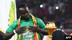 FILE - Senegal's forward Sadio Mane celebrates after winning the African Cup of Nations which was held in Cameroon, February 6, 2022.