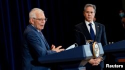 European Union High Representative for Foreign Affairs and Security Policy Josep Borrell Fontelles, left, accompanied by Secretary of State Antony Blinken, right, speaks during news conference at the State Department in Washington, Feb. 7, 2022. 