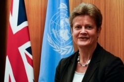 British Ambassador to the United Nations Barbara Woodward, who requested Friday's meeting, poses for a photo, Jan. 5, 2021, in New York