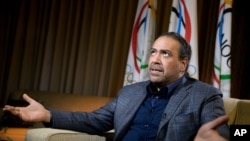 Kuwaiti Sheik Ahmad Al-Fahad Al-Sabah speaks during an interview with the Associated Press, Oct. 26, 2015, in Washington. Kuwait was suspended by the IOC for political interference, leaving its athletes in limbo. Progress toward lifting that ban has been made, according to the IOC Wednesday.