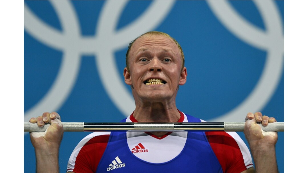 FILE - Russia's Andrey Demanov competes during the men's 94kg group A weightlifting event of the London 2012 Olympic Games at The Excel Centre in London on August 4, 2012.