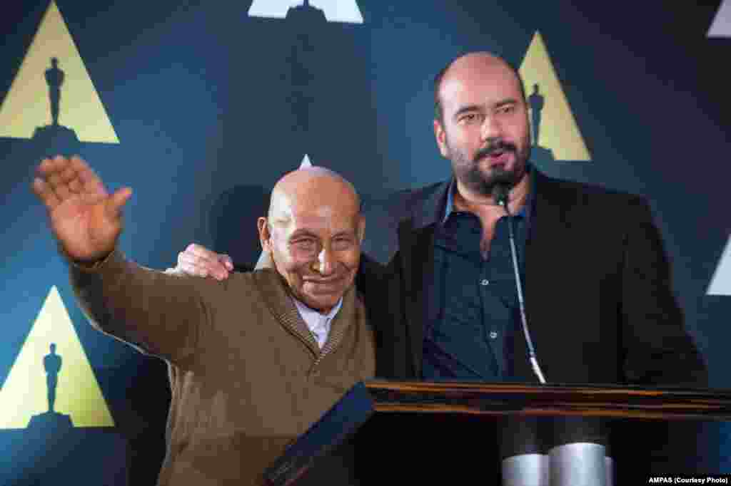 Antonio Bolivar and Foreign Language Film Award nominee Ciro Guera, “Embrace of the Serpent” at the reception for the Foreign Language Film Award category for the 88th Oscars® on Feb. 26, 2016.