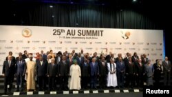 FILE - African leaders pose for pictures ahead of the 25th African Union (AU) summit in Johannesburg, June 14, 2015. 