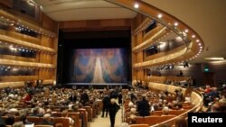 Guests take their seats for a "pre-premiere" performance, put on for veterans, senior employees of the theater and other special guests, in the new Mariinsky Theater in St. Petersburg, May 1, 2013. 