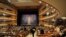 Guests take their seats for a "pre-premiere" performance, put on for veterans, senior employees of the theater and other special guests, in the new Mariinsky Theater in St. Petersburg, May 1, 2013. 