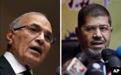 Ahmed Shafiq (à g.) a félicité Mohamed Morsi pour sa victoire au second tour des 16 et 17 juin