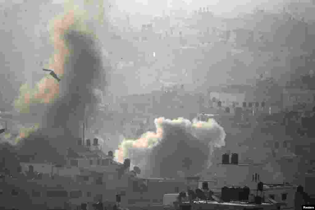 Smoke rises following air strikes in Gaza Aug. 26, 2014.