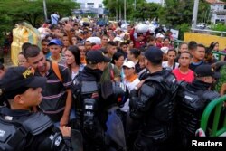 Colombian riot police block the way to the Colombian side in the Colombian-Venezuelan border on the Simon Bolivar International Bridge in Cucuta, Colombia, April 2, 2019.