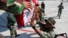 Soldiers unload relief supplies from a military aircraft for earthquake and tsunami victims at Mutiara Sis Al Jufri Airport in Palu, central Sulawesi, Indonesia, Oct. 3, 2018.