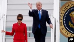 U.S President Donald Trump and first lady Melania arrive at Orly airport, south of Paris, July 13, 2017. Trump and his French counterpart, Emmanuel Macron, are looking to set aside differences on trade and climate change and find common ground as they mee