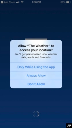 A mobile phone with The Weather Channel app location preference page is seen Jan. 4, 2019.