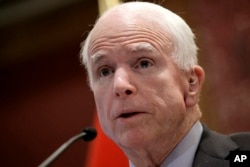 FILE- This June 3, 2016, file photo shows Sen. John McCain, R-Ariz., delivering a speech. Senate Republicans running for re-election weighed in one after another on Aug. 1, 2016, to condemn Republican presidential candidate Donald Trump’s repeated attacks on the parents of slain U.S. Army Capt. Humayun Khan, with former prisoner of war Sen. John McCain of Arizona leading the charge.