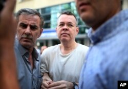 FILE - Andrew Brunson, an evangelical pastor from Black Mountain, North Carolina, is taken to his house in Izmir, Turkey, July 25, 2018.