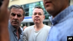 Andrew Craig Brunson, an evangelical pastor from Black Mountain, North Carolina, arrives at his house in Izmir, Turkey, Wednesday, July 25, 2018. (AP Photo/Emre Tazegul)