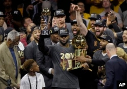 Cleveland's NBA team celebrates its first championship in June.