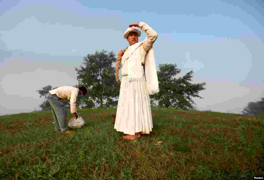 A priest takes part in the Shikali festival at Khokana in Lalitpur, Nepal.