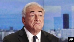 Dominique Strauss-Kahn answers questions during an interview with French TV station TF1.