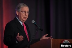 FILE - U.S. Senate Majority Leader Mitch McConnell speaks at the Republican Party of Kentucky's Lincoln Dinner in Louisville, Aug. 26, 2017.