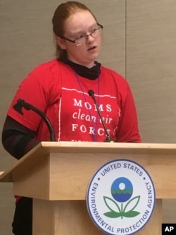 Alexis Elliott, 13, speaks at a U.S. EPA hearing in Denver, Nov. 14, 2018, on methane. Elliott said emissions from oil and gas wells near her school are causing her serious health problems.