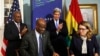 (L-R) Ghana President John Dramani Mahama, Ghana Finance Minister Seth Terkper, U.S. Secretary of State John Kerry and Dana Hyde, CEO of the Millennium Challenge Corporation (MCC), participate in the Ghana Compact Signing Ceremony at the State Department 