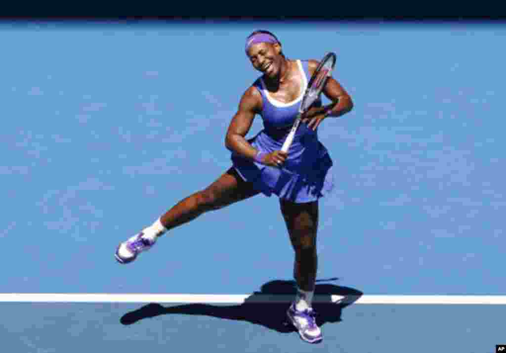 Serena Williams of the U.S. reacts during her women's singles match against Barbora Zahlavova Strycova of the Czech Republic at the Australian Open tennis tournament in Melbourne January 19, 2012.