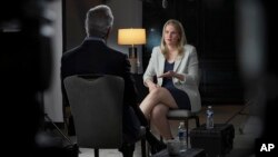 In this Sept. 16, 2021, photo provided by CBS, Facebook whistleblower Frances Haugen talks with CBS' Scott Pelley on "60 Minutes," in an episode that aired Sunday, Oct. 3.