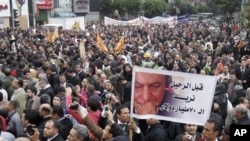 Egyptian lawyers in black robes stream into Cairo's Tahrir Square, February 10, 2011