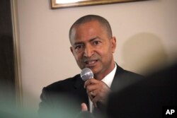 FILE - Congolese opposition leader, Moise Katumbi, speaks during a press conference at his lawyer's office in Paris, June 16, 2017.