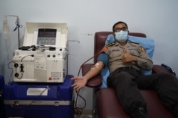 Agung Untoro, anggota Polisi dari Polda DIY yang menjadi donor plasma untuk pasien corona. (Foto: Humas RS Sardjito)