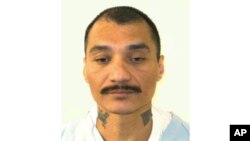 FILE - This undated photo provided by the Virginia Department of Corrections shows inmate Alfredo Prieto.