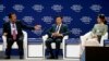 Cambodia's Prime Minister Hun Sen, left, gestures as he talks his vision on the Mekong region as Laos' Prime Minister Thongloun Sisoulith, center, and Myanmar State Counsellor Aung San Suu Kyi listen in the World Economic Forum on ASEAN at the National Convention Center Wednesday, Sept. 12, 2018, in Hanoi, Vietnam. The World Economic Forum has attracted hundreds of participants for the three-day forum with the theme: ASEAN 4.0: Entrepreneurship and the Fourth Industrial Revolution. (AP Photo/Bullit Marquez)