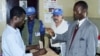 Man votes as UN observers look on in Bangui, Central African Republic