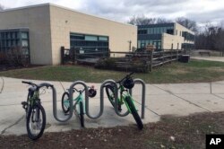 Bicycles are parked outside the Tokeneke Elementary School in Darien, Conn., Nov. 27, 2018.