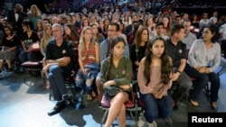 Marjory Stoneman Douglas High School students and parents wait for a CNN town hall meeting to begin, at the BB&T Center, in Sunrise, Florida, Feb. 21, 2018.