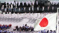 টোকিও ২০২০ প্যারালিম্পিক গেমসের উদ্বোধনী অনুষ্ঠানের সময় ইতালির ক্রীড়াবিদরা। ২৪ আগস্ট ২০২১