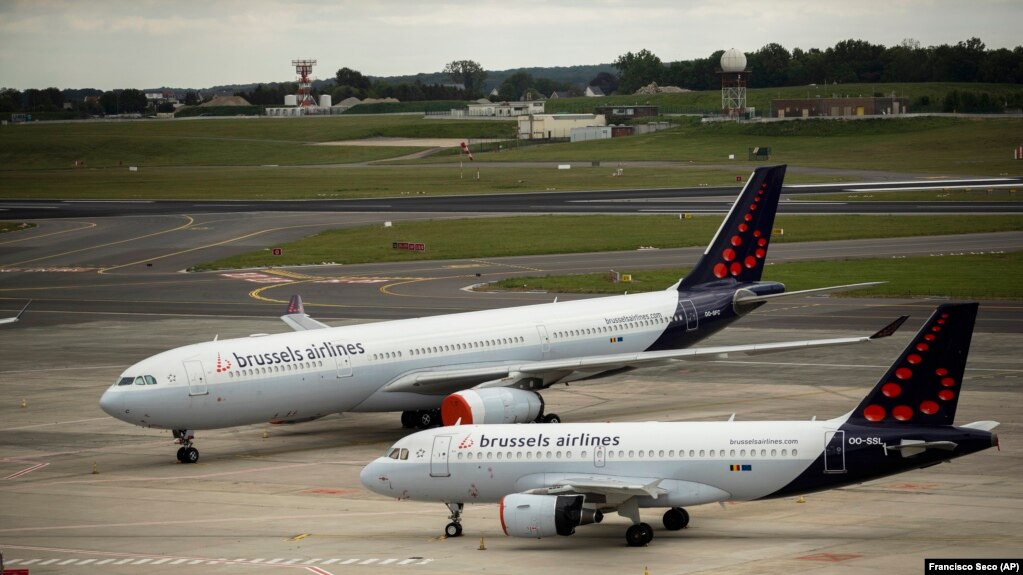 FILE - Two planes from Brussels Airlines are shown in this file photo on one of the routes for planes at Brussels Airport in Brussels on May 12, 2020. (AP Photo/Francisco Seco, File)