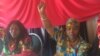 Defence Minister Oppah Muchinguri-Kashiri chanting the Zanu PF slogan in Mutare ...