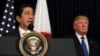 Japanese Prime Minister Shinzo Abe delivers remarks on North Korea accompanied by U.S. President Donald Trump at Mar-a-Lago club in Palm Beach, Florida, Feb. 11, 2017.