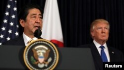 Japanese Prime Minister Shinzo Abe delivers remarks on North Korea accompanied by U.S. President Donald Trump at Mar-a-Lago club in Palm Beach, Florida, Feb. 11, 2017.