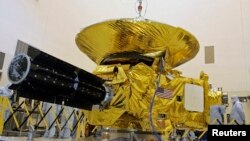 FILE - NASA's New Horizons spacecraft is displayed at the Kennedy Space Center in Cape Canaveral, Florida.