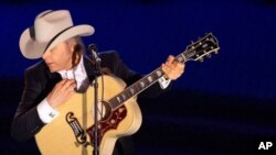 Dwight Yoakam performing at a music awards ceremony in June