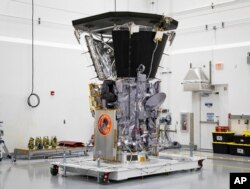 The Parker Solar Probe sits in a clean room at Astrotech Space Operations in Titusville, Fla., after the installation of its heat shield, July 6, 2018.