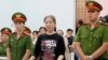 Vietnamese Dissident Mother Mushroom En Route to US After Release