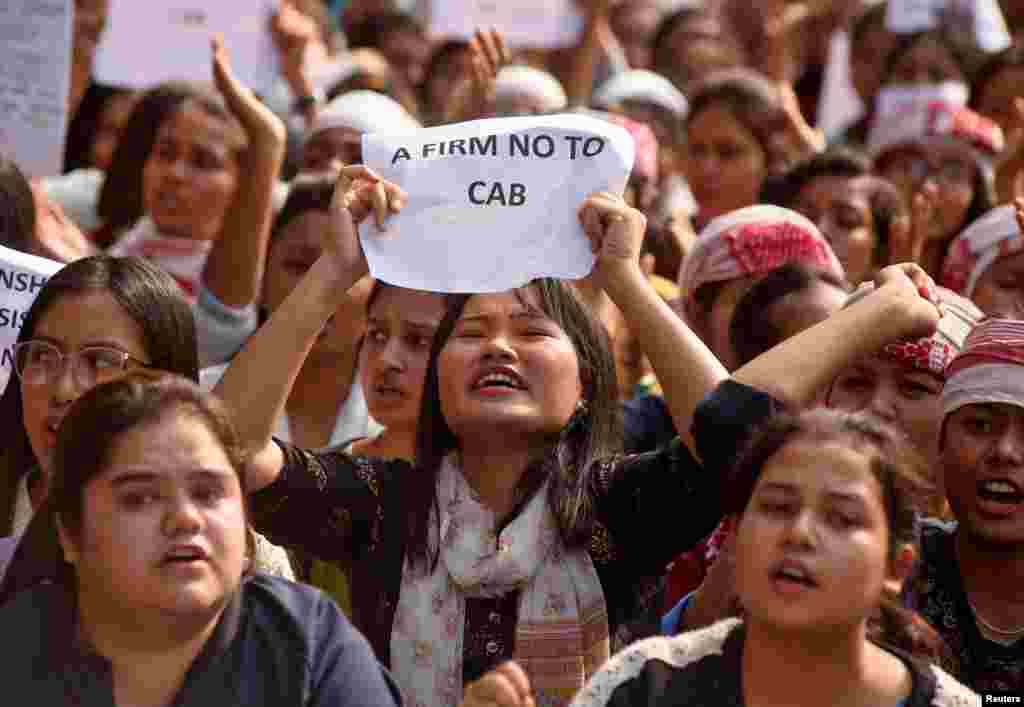 Demonstrators shout expressions during a protest against the Citizenship Amendment Bill (CAB), which seeks to give citizenship to religious minorities persecuted in neighboring Muslim countries, in Guwahati, India.