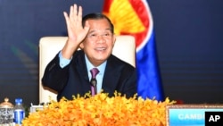 FILE - In this photo provided by the An Khoun Sam Aun/National Television of Cambodia, Cambodian Prime Minister Hun Sen joins an online meeting of the ASEAN-China special summit at Peace Palace in Phnom Penh, Cambodia, Nov. 22, 2021. 