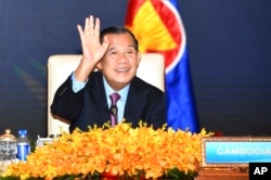 FILE - In this photo provided by the An Khoun Sam Aun/National Television of Cambodia, Cambodian Prime Minister Hun Sen joins an online meeting of the ASEAN-China special summit at Peace Palace in Phnom Penh, Cambodia, Nov. 22, 2021.