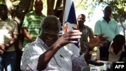 FILE - Renamo's Afonso Dhlakama gives a press conference in Gorongosa's mountains, Mozambique, , April 10, 2013. 